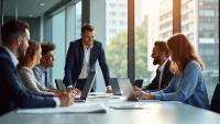 Professional team in business attire brainstorming around a conference table in a modern office.